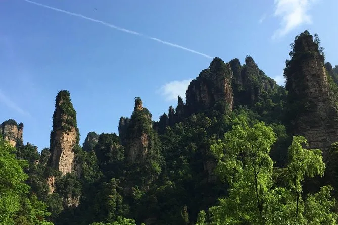 Zhangjiajie: Charm Xiangxi Folk Show Evening + Tujia Dinner Tour · 3/4